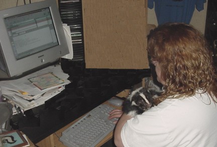 Photo of Cathy Dalgliesh and one of her skunks